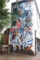 The completed mural with rocket01, the artist.